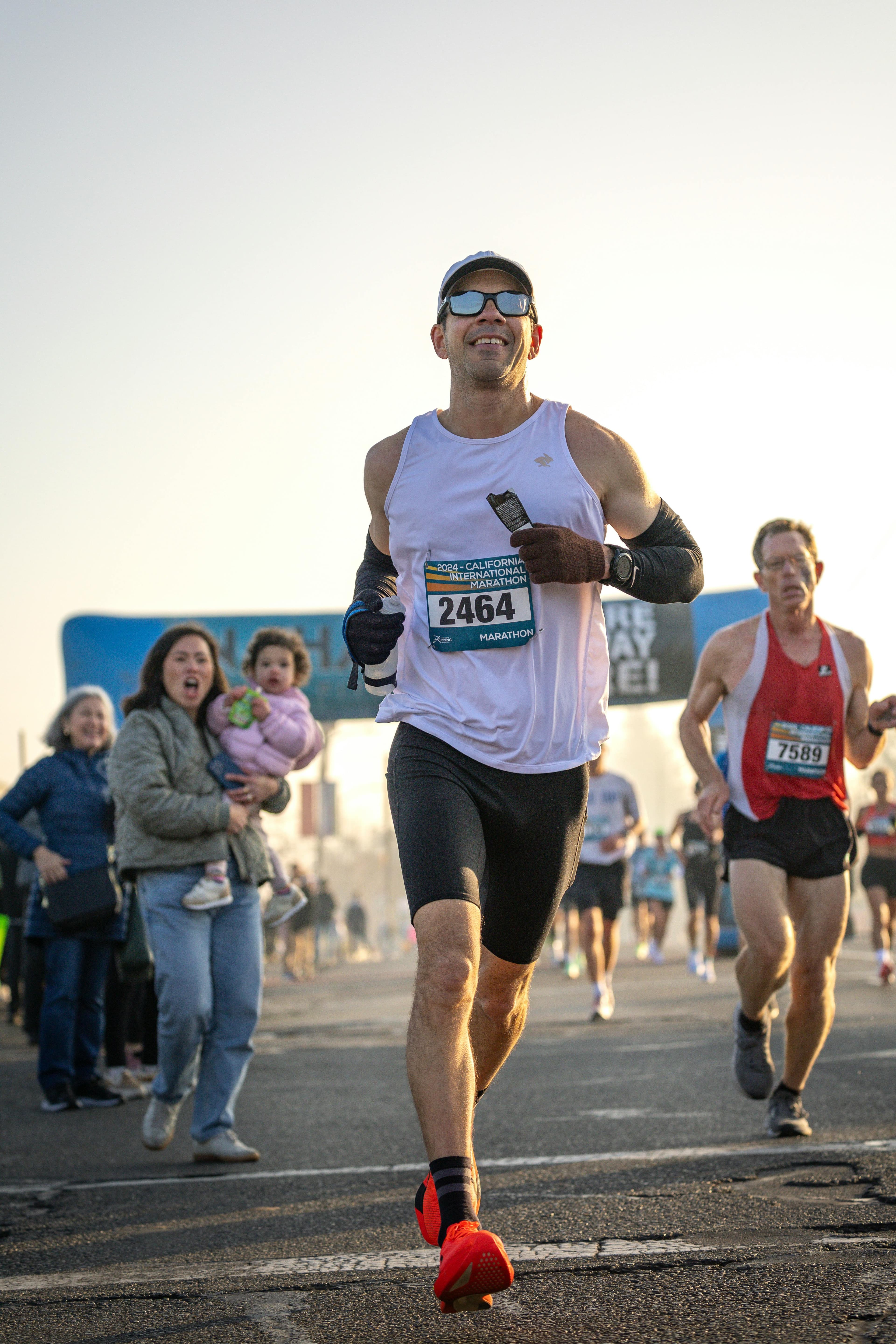 Runners on a mountain road